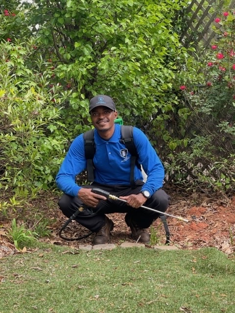 Curtiss Wheeler, owner of Allsect Pest Control, treating an Atlanta home